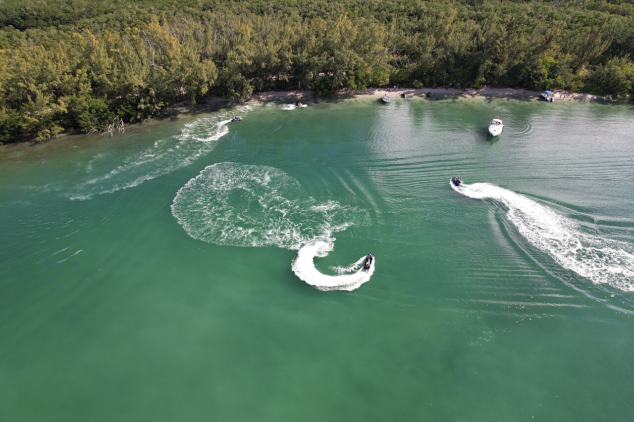 Traveler riding a Jet Ski along the Dubai coast